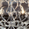 Dettaglio plafoniera design contemporaneo con ganci in vetro di Murano trasparente 500-PL60 collezione Legami